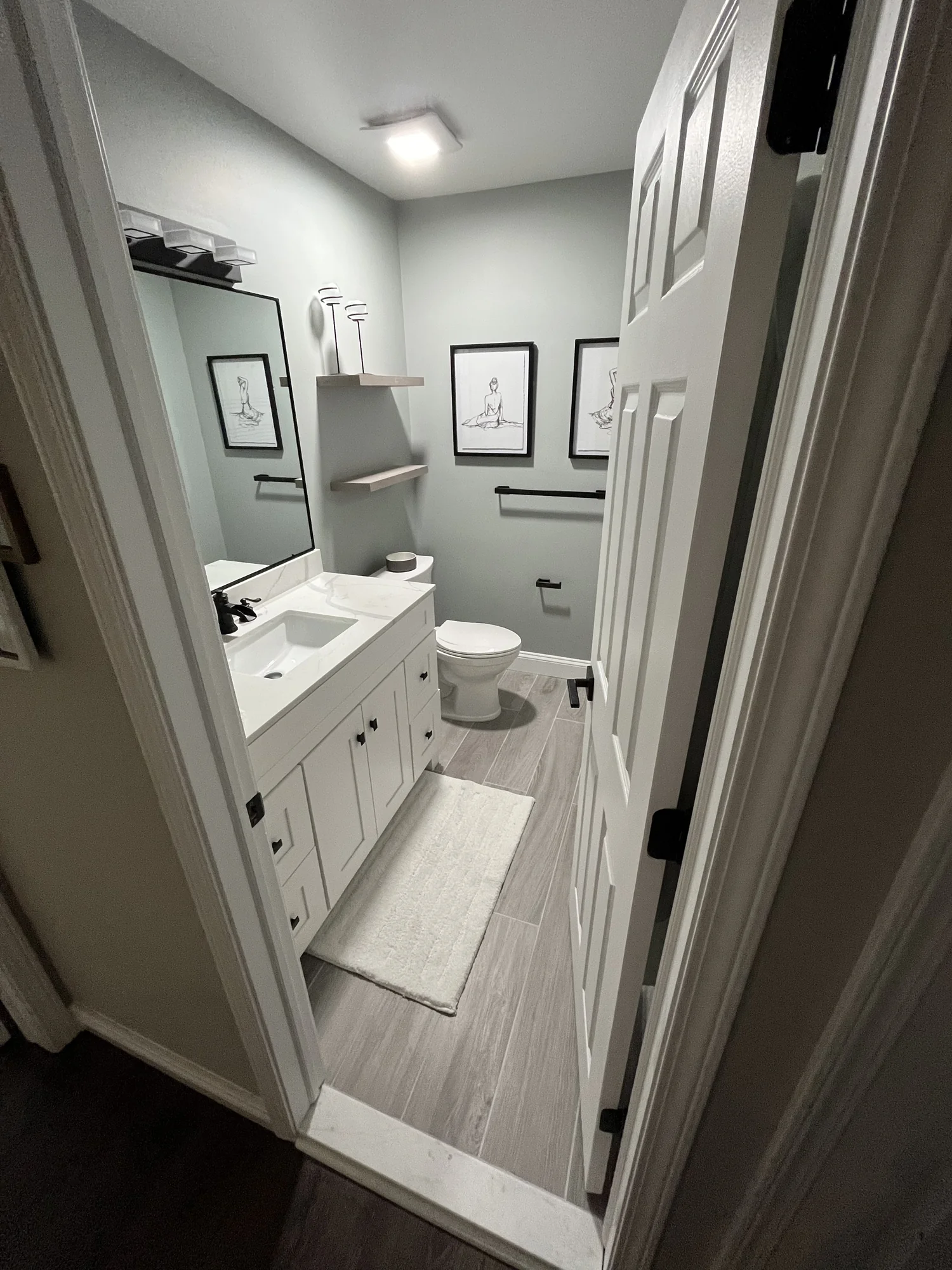Black Vanity White Tile Bath — photo 3