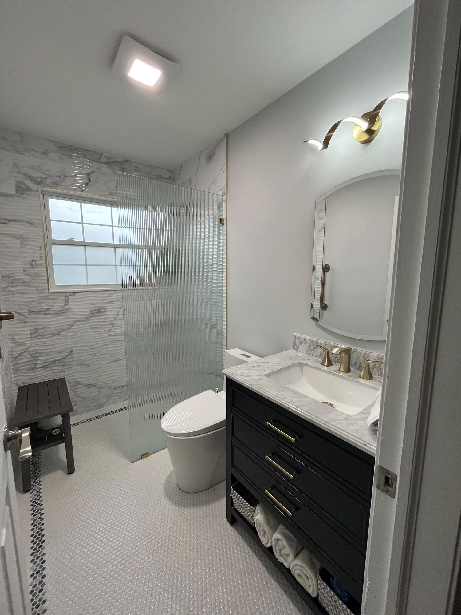 Black Vanity White Tile Bath — photo 5