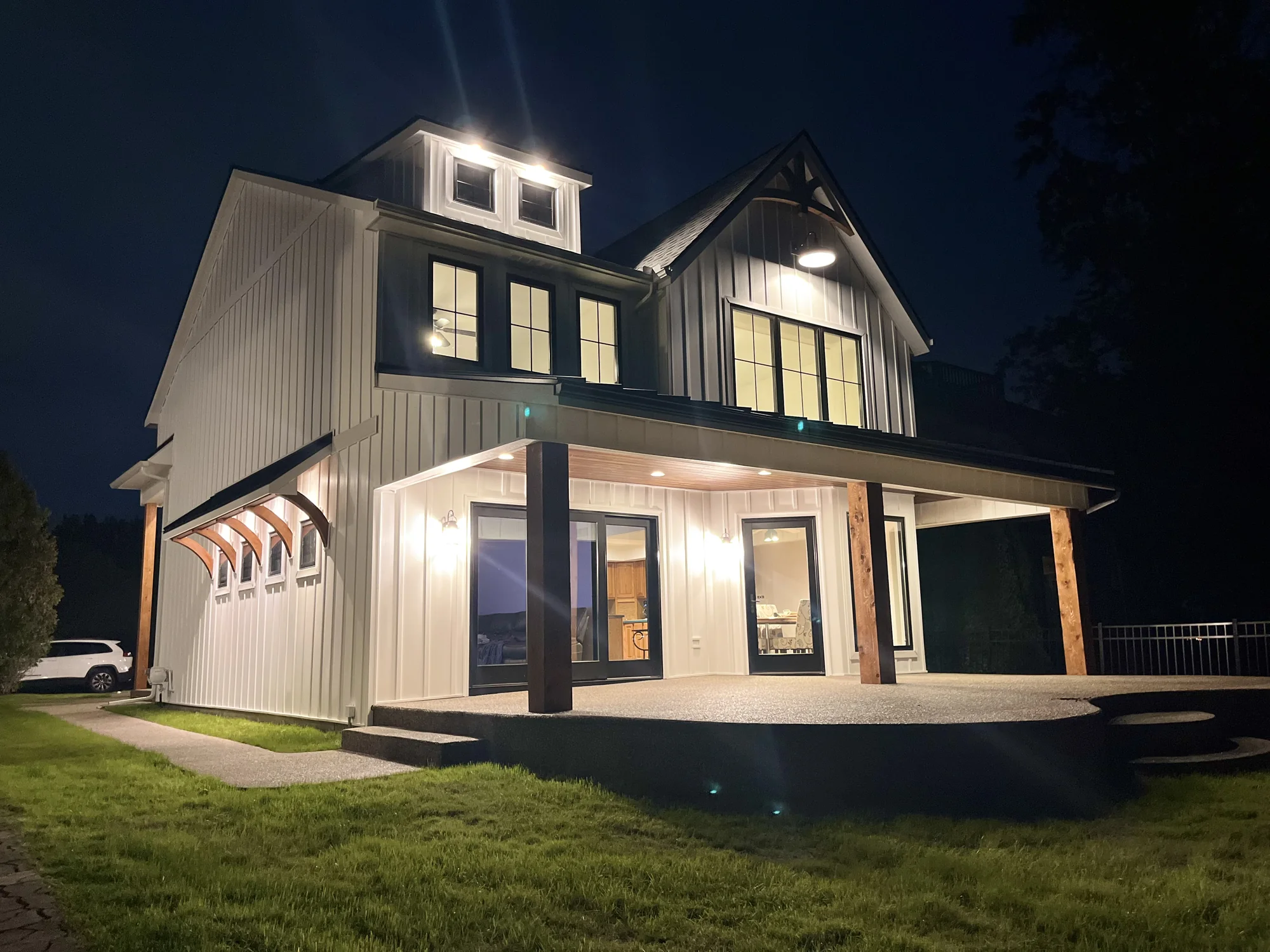 Modern Farmhouse at Night — photo 9
