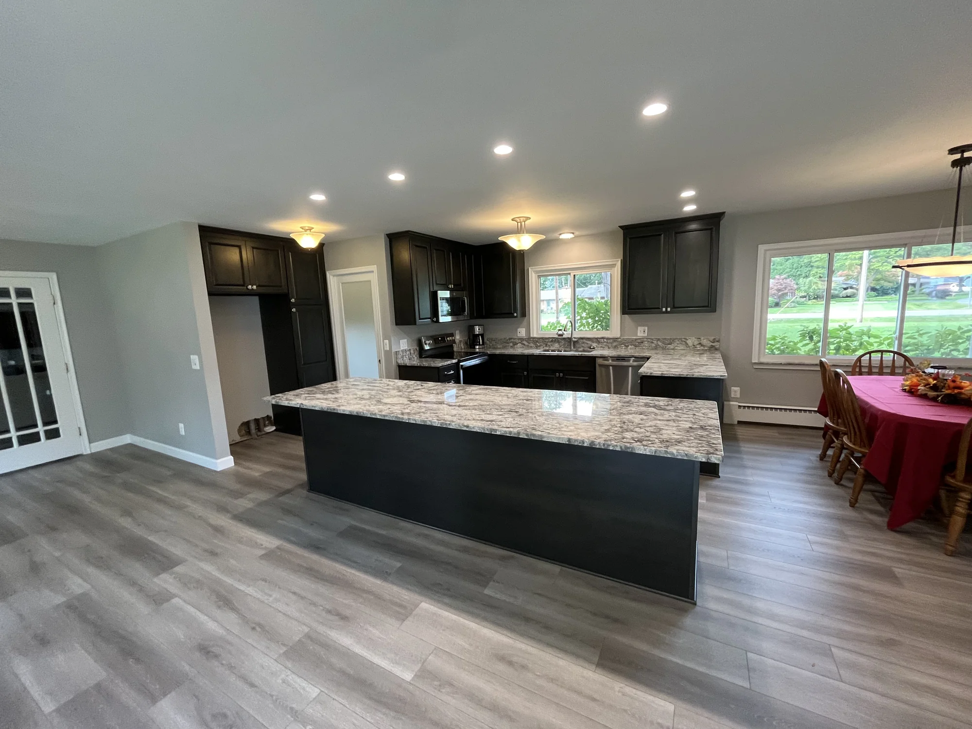 Dark Wood + White Quartz Kitchen — photo 17