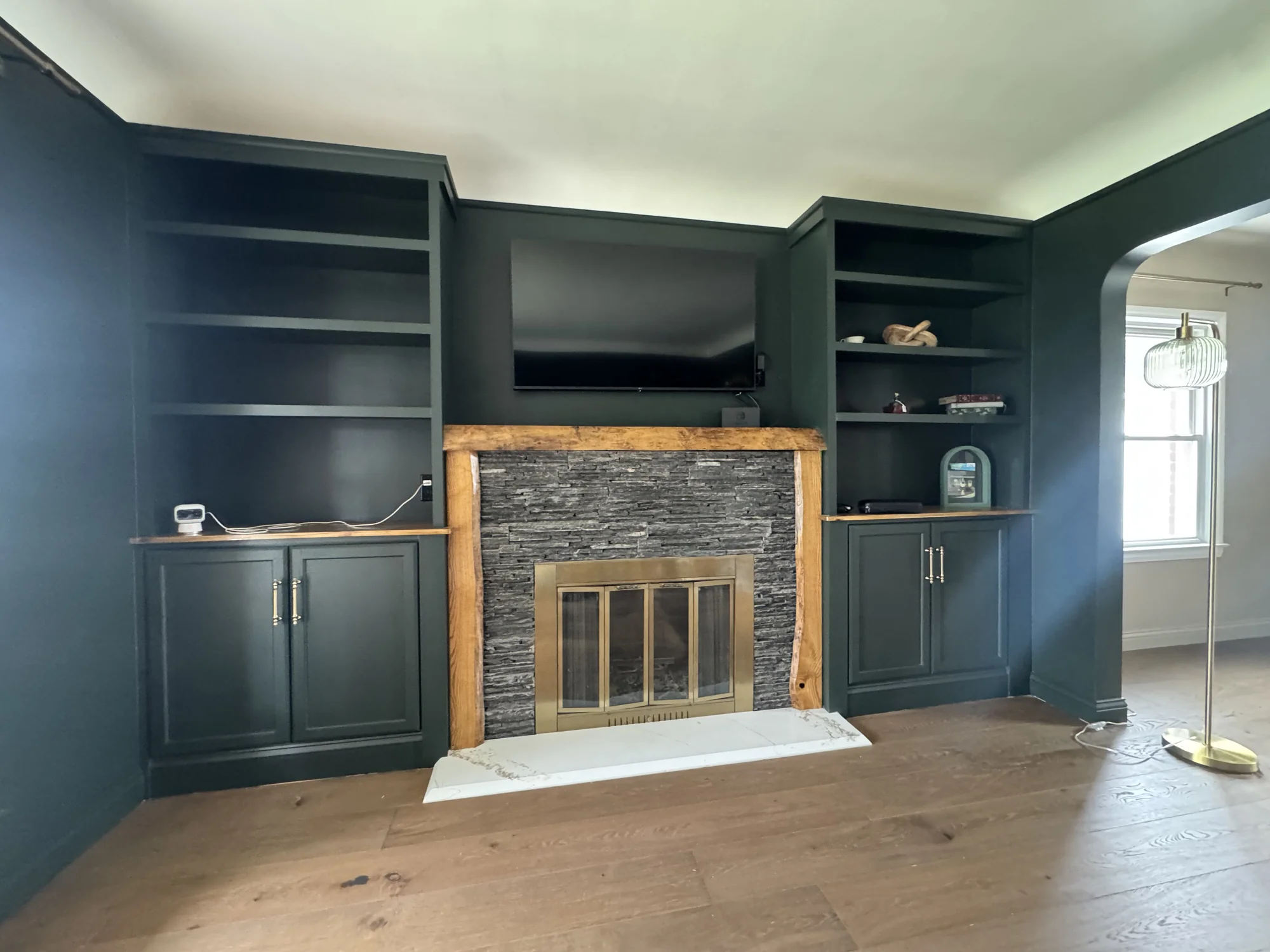 Dark Green Fireplace Living Room — photo 3